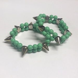 2 spike and seafoam green bracelets